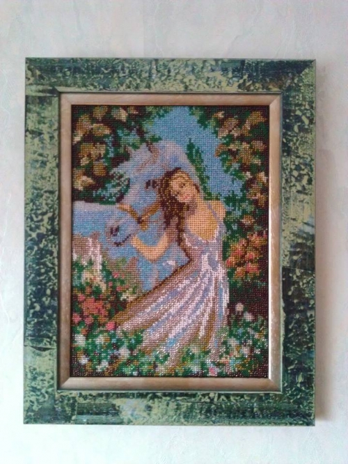 Cross-stitch "The girl with the horse"